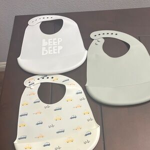 Set of 3 bibs amazing condition.
